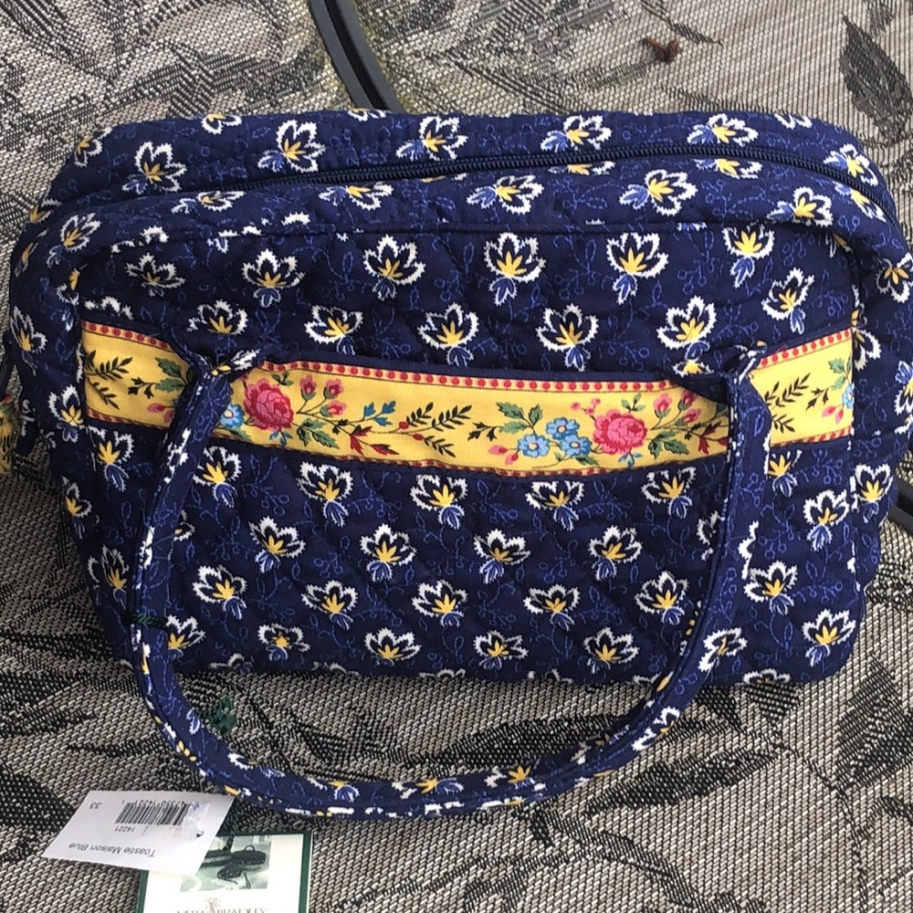 Floral Blue Quilted Handbag by Vera Bradley
Toastie Maison Blue